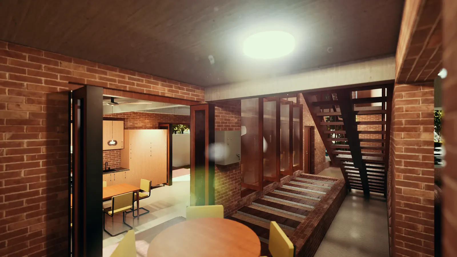 Ground floor alfresco: round dining table in the foreground, spiral stair at centre, kitchen visible through the brick opening to the right