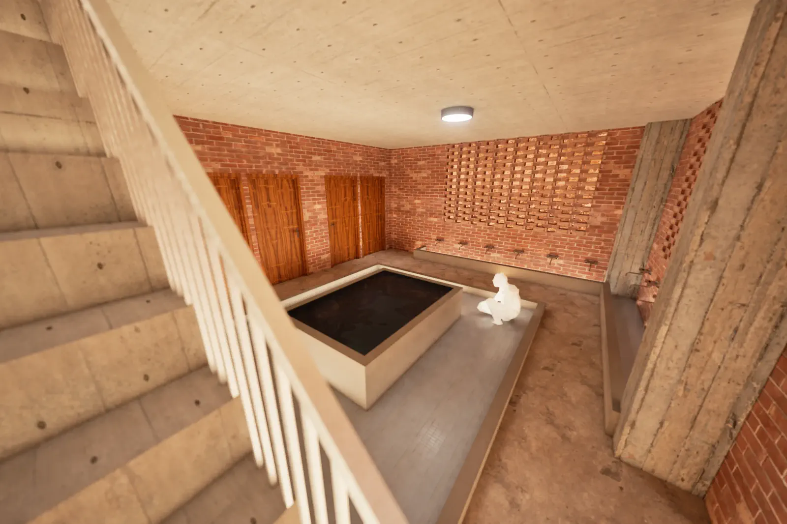 Proposed: interior staircase landing with water feature