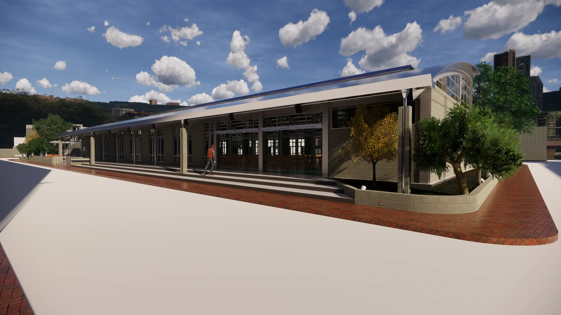Canteen exterior: barrel-vaulted roof and glazed facade, day view