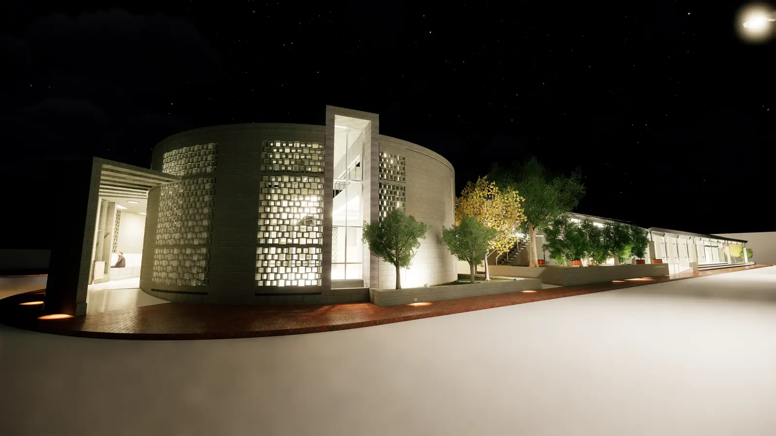 Mosque at night: lattice screen glows as light filters from within