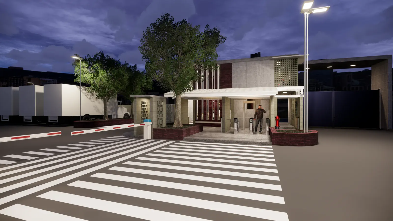 Gatehouse entry at dusk: boom gate, pedestrian crossing, and entry building