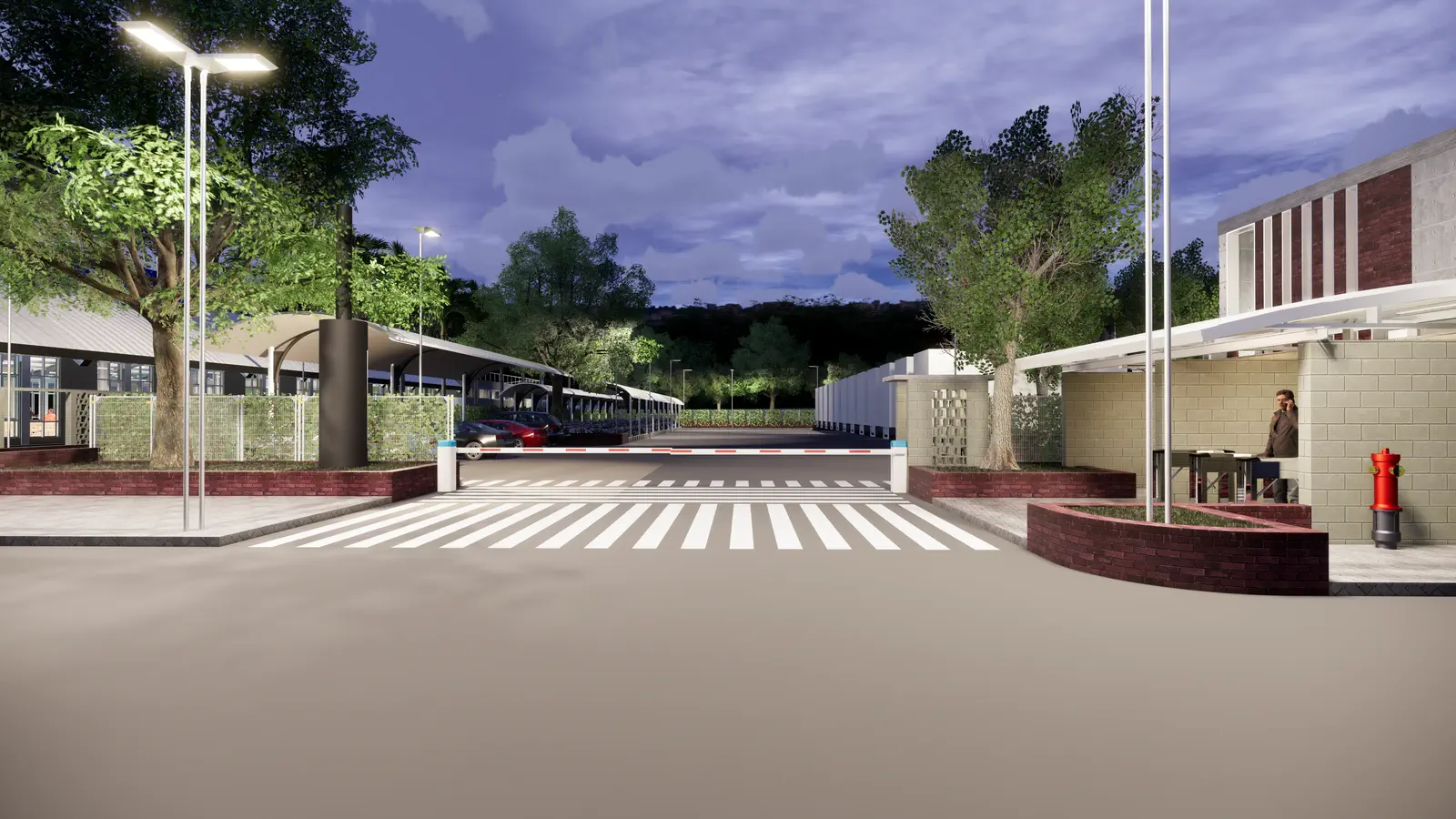 Street-level gate approach at night: landscaped entry with gatehouse and canopy