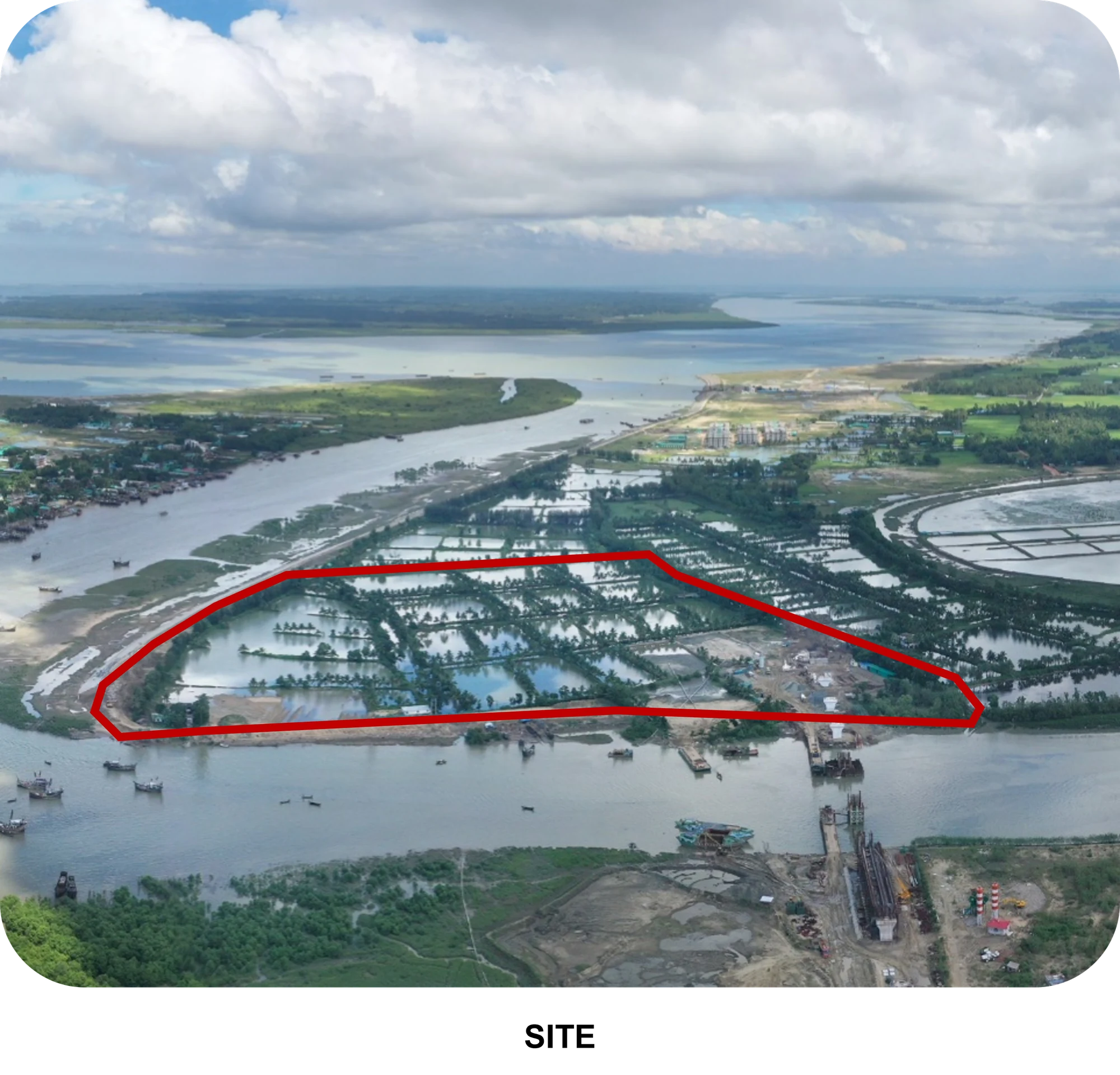 Aerial photograph of the existing Khurushkul site, outlined in red, showing the surrounding tidal channels, fish farms, the Bakkhali Bridge under construction and reclaimed land beyond