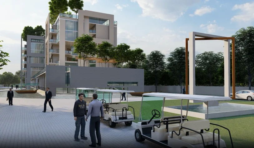 Approach to the resort buildings: the driveway boulevard lined with planters and trees, the two G+5 accommodation blocks rising ahead, the elevated terrace connecting them above the ground level