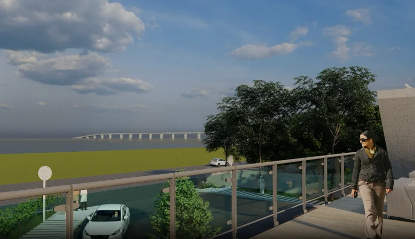 The river view from the Riverside Restaurant: the Padma River stretching to the horizon, the Padma Bridge spanning the water in the distance, seen through the full-height glazed wall of the restaurant