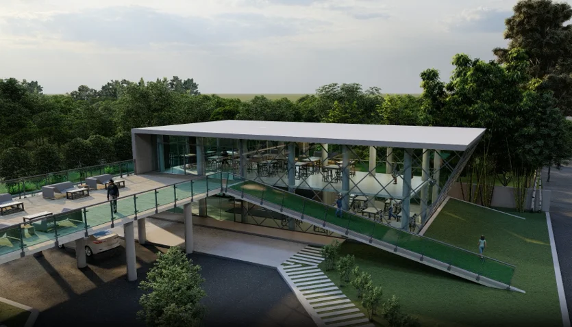 Riverside restaurant exterior: a low-slung pavilion building with a full-height glazed river-facing wall, set on the edge of the water body, the boating ghat and Padma beyond