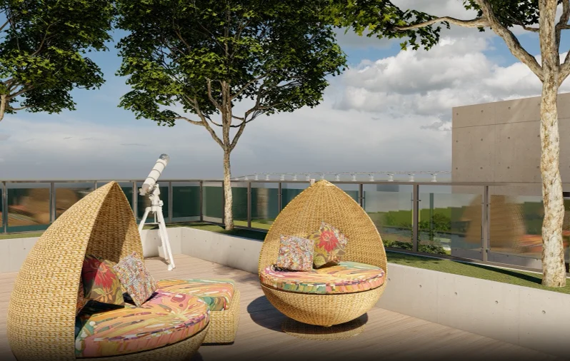Rooftop viewing deck: pod-form rattan loungers arranged on the tiled roof terrace, mature trees framing the view, the Padma River visible on the horizon at the railing