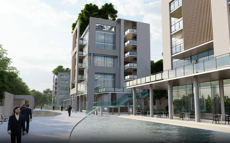 View of the resort building from the water park: the G+5 accommodation block seen across the pool and water park amenity area, the elevated terrace visible above the ground-floor programme