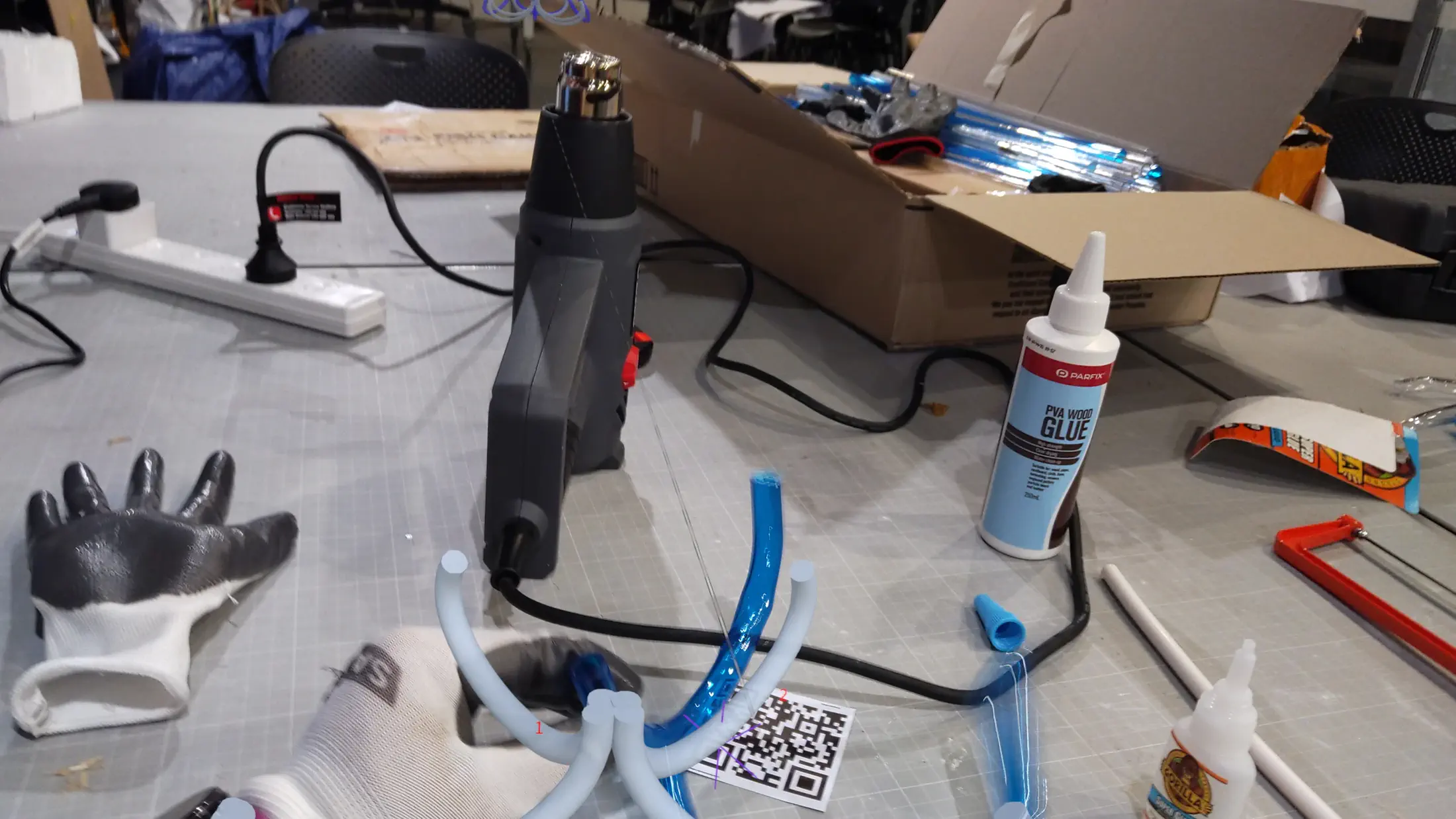 HoloLens capture: AR sequencing mode — step-by-step holographic instructions projecting insertion order onto the physical assembly